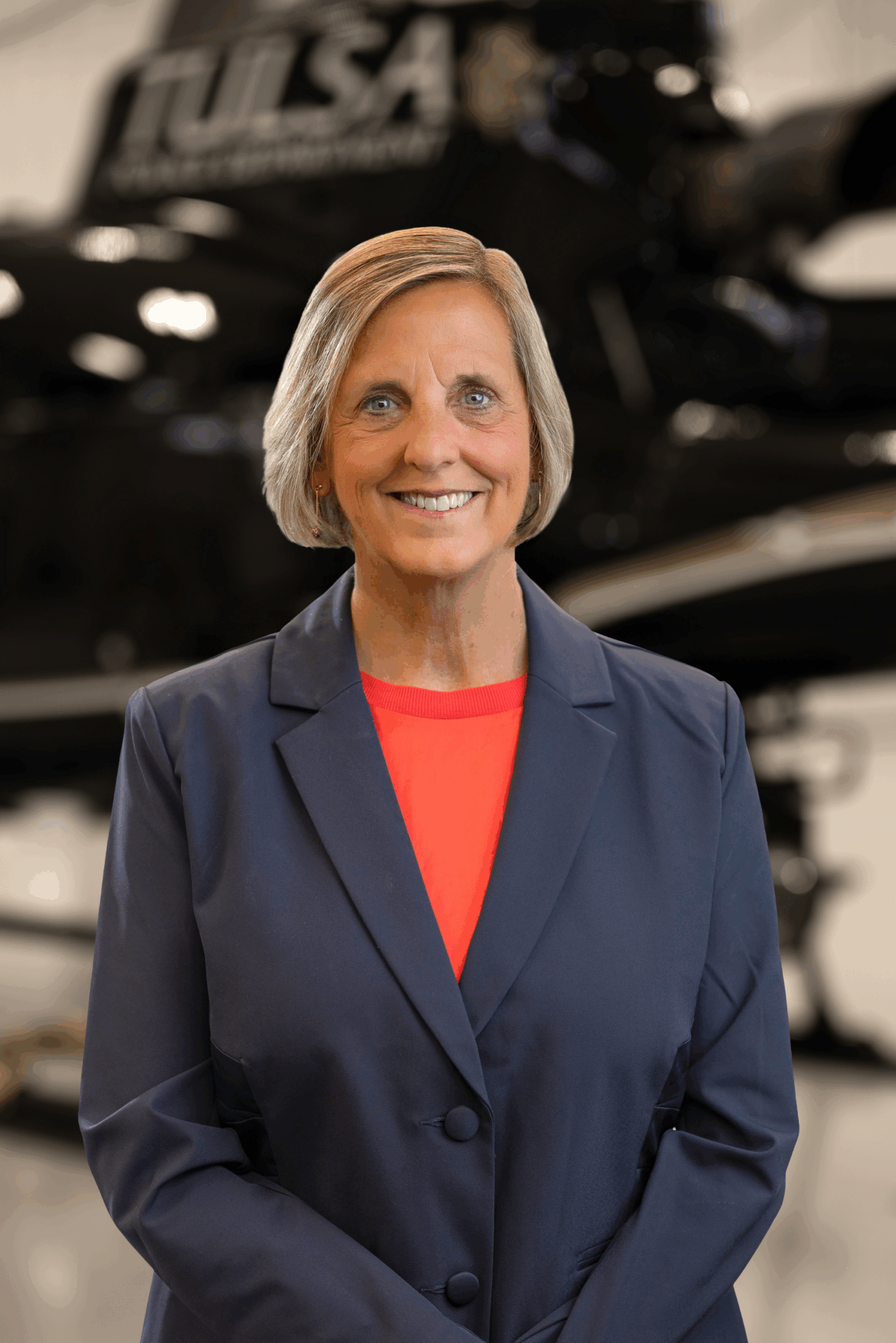 Smiling professional woman in navy blazer